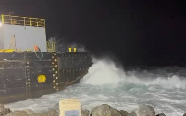 Unified Command, marine salvors refloat grounded barge just off San Juan Harbor port entrance
