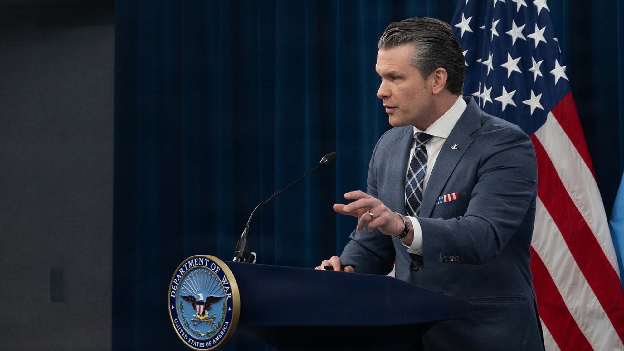 Secretary of War Pete Hegseth and Air Force Gen. Dan Caine, chairman of the Joint Chiefs of Staff, hold a press conference at the Pentagon, March 19, 2026.