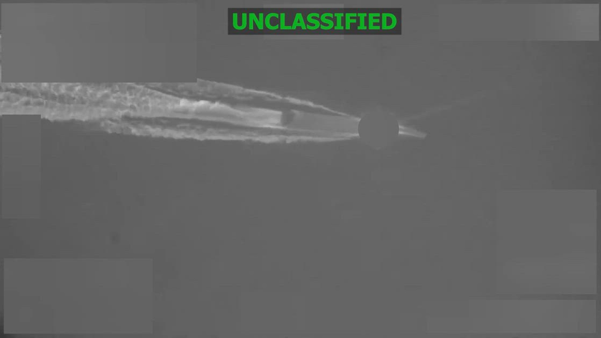 Black and white overhead video of a boat.