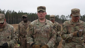 1st Lt. John McIntyre discusses Spur Ride at Pabrade Training Area