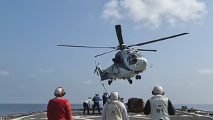 USS Milius (DDG 69) conducts a Replenishment-at-Sea during Operation Epic Fury