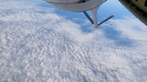 KC-135 Stratotanker aerial refuels B-52H Stratofortress during Operation Epic Fury