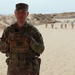 Spc. Bryan Williams discusses Schützenschnur qualification in Lithuania