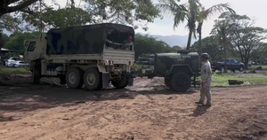Hawaii National Guard assists Waialua residents with debris removal, water distribution