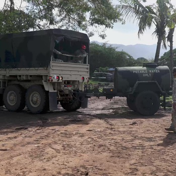 Hawaii National Guard assists Waialua residents with debris removal, water distribution