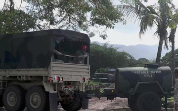Hawaii National Guard assists Waialua residents with debris removal, water distribution