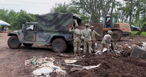 Hawaii National Guard assists Waialua residents with flood debris removal