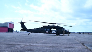 B-roll of U.S. Air Force Airmen, assigned to 146th Aeromedical Evacuation Squadron, California Air National Guard, practicing carrying a litter during exercise Sentry South 26-2, Gulfport, Mississippi, Feb. 25, 2026.