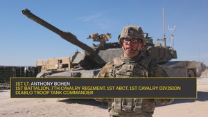 1st Lt. Anthony Bohen speaks on tank gunnery