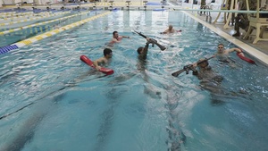 Best Warrior Competitors Complete Combat Water Survival Test in Cumming