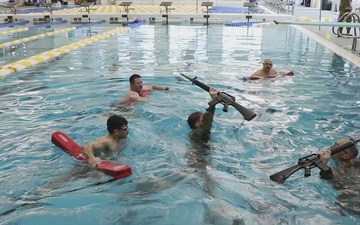 Best Warrior Competitors Complete Combat Water Survival Test in Cumming