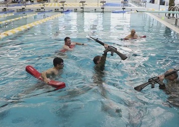 Best Warrior Competitors Complete Combat Water Survival Test in Cumming