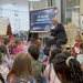 Under Secretary Anthony J. Tata Reads "Lil’ Marine" to Excited First-Graders at DoWEA Americas Crossroads Elementary School