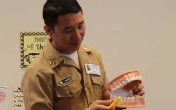 Lemoore Military Kids Learn to Defeat Cavities with Help from Navy Dentists