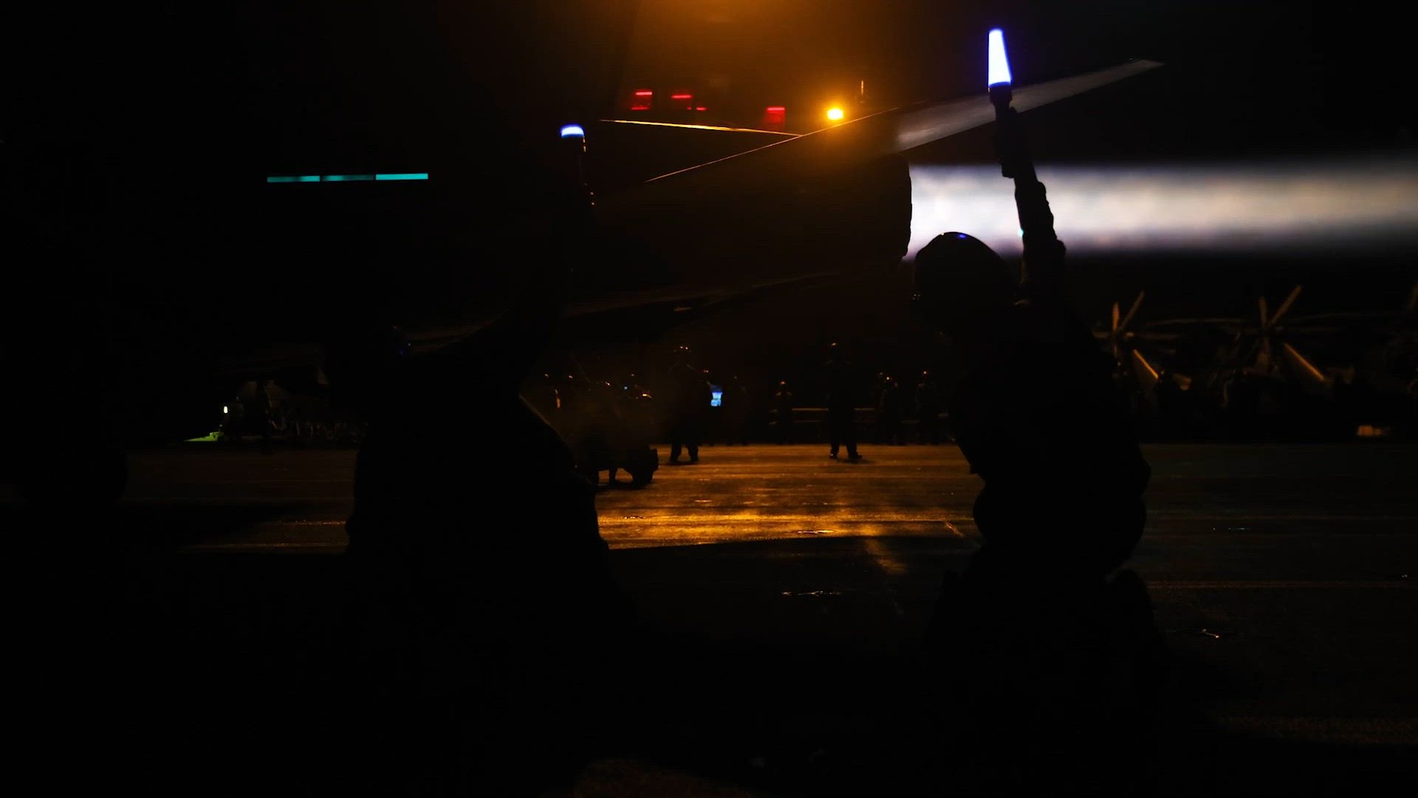 Sailors assigned to USS Abraham Lincoln (CVN 72) conduct flight operations at night in support of Operation Epic Fury, March 15, 2026. (U.S. Navy video)