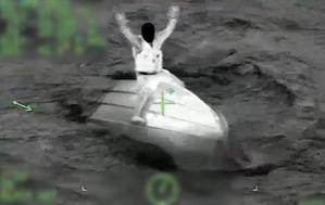 Coast Guard, Puerto Rico Police aircrews rescue 3 federal agents and 2 boaters off Isla de Cabras in Toa Baja, Puerto Rico