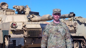 U.S. Army Spc. Morgan Green discusses Abrams familiarization in Lithuania