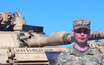 U.S. Army Spc. Morgan Green discusses Abrams familiarization in Lithuania