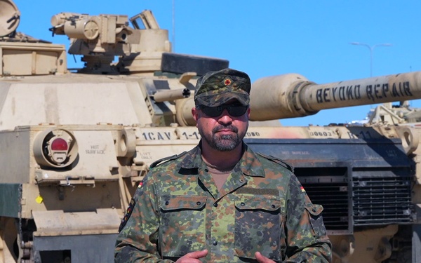 German Army Master Sgt. Steven Solis discusses Abrams familiarization in Lithuania