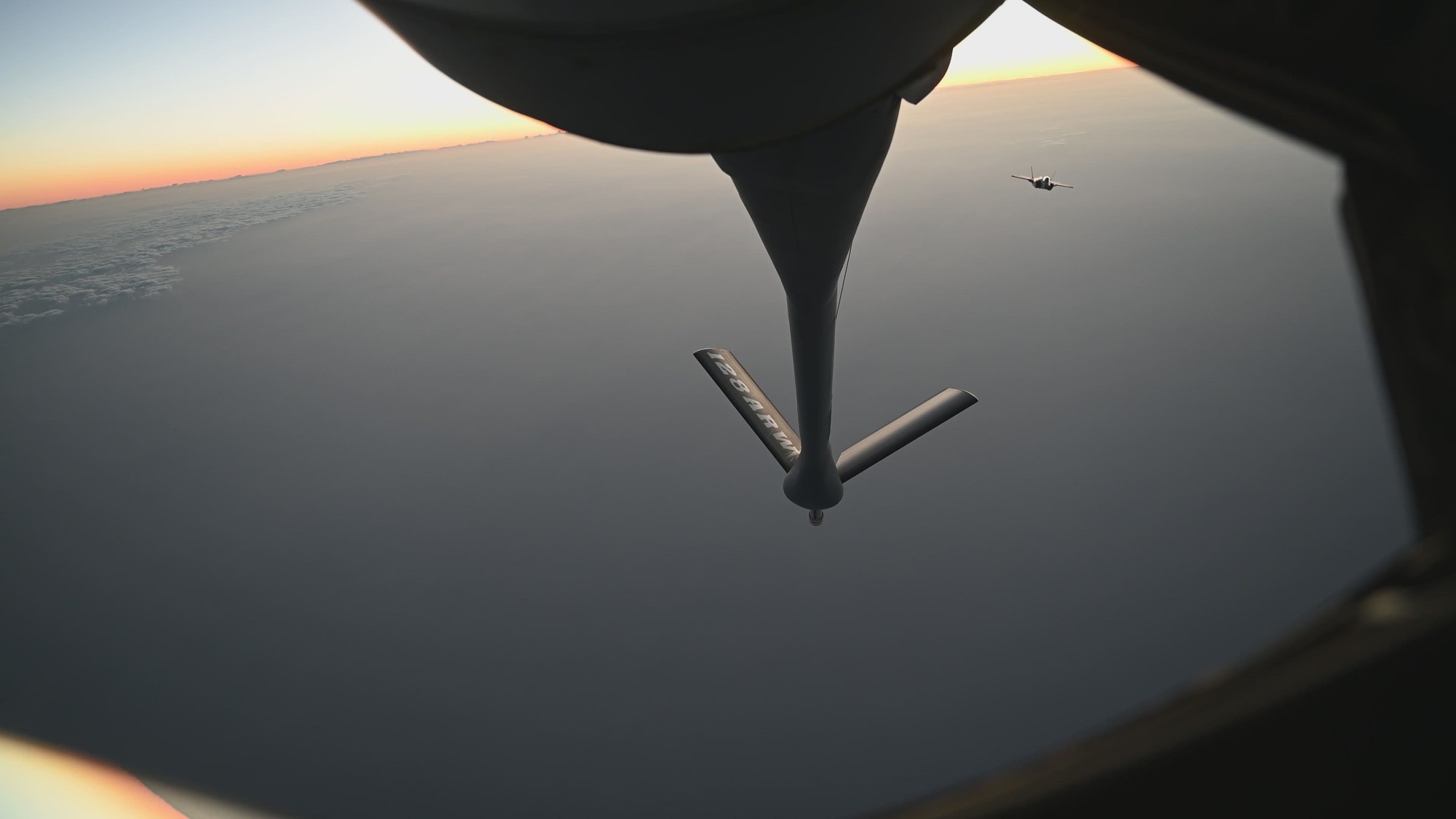 A U.S. Air Force KC-135 Stratotanker aircraft refuels a U.S. Air Force F-35A Lightning II and F-15E Strike Eagle aircraft during Operation Epic Fury in the U.S. Central Command area of responsibility, April 5, 2026. (U.S. Air Force video)