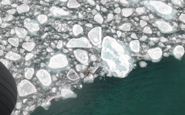 Coast Guard Air Station Traverse City crew conducts ice-rescue training in Grand Traverse Bay