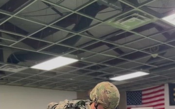 Indiana National Guard H2F coach demonstrates proper ruck packing techniques at Camp Atterbury