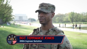Mississippi National Guardsmen help a civilian that experienced a seizure at the Lincoln Memorial Reflecting Pool