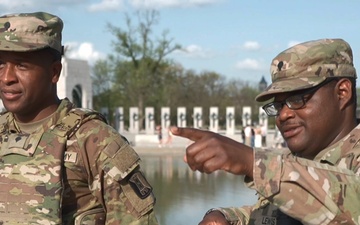 Mississippi National Guardsmen help a civilian that experienced a seizure at the Lincoln Memorial Reflecting Pool