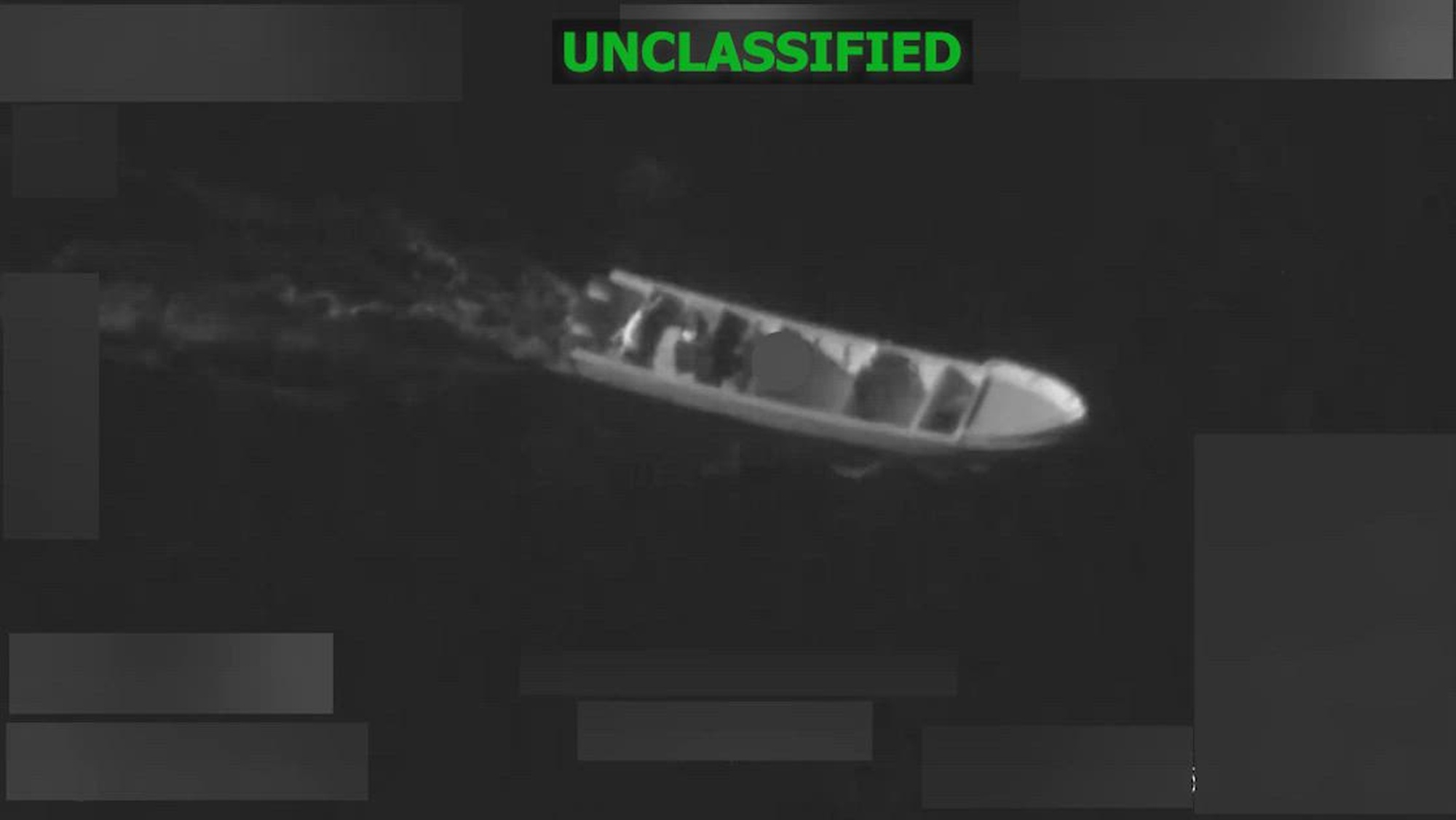 Black and white overhead video of a boat.