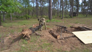 101st Soldiers cut and dig to improve fighting positions on 'gun line' at JRTC