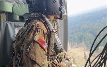 Fighting Fires Together: Washington Guard aviation unit conducts water bucket training with DNR and USFS.