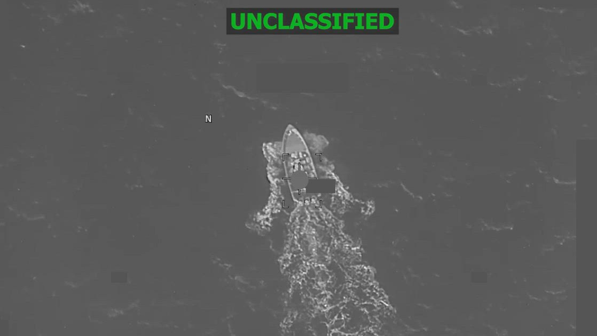 Black and white overhead video of a boat.