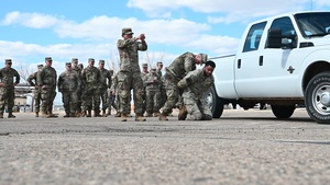 Defenders from the 5th Security Forces Squadron conduct joint training with the 816th Military Police Company.