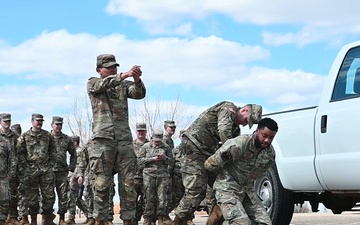 Defenders from the 5th Security Forces Squadron conduct joint training with the 816th Military Police Company.