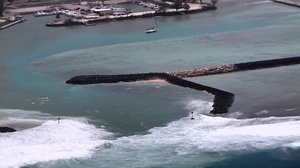 U.S. Coast Guard conducts overflights to assess hazards, damage following Typhoon Sinlaku