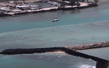 U.S. Coast Guard conducts overflights to assess hazards, damage following Typhoon Sinlaku