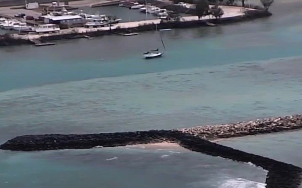 U.S. Coast Guard conducts overflights to assess hazards, damage following Typhoon Sinlaku