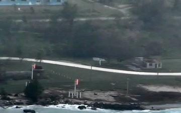 U.S. Coast Guard conducts overflights to assess hazards, damage following Typhoon Sinlaku