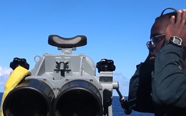 USS John Finn (DDG 113) Sailor stands watch