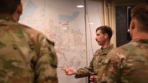Defenders from the 5th Security Forces Squadron conduct joint training with the 816th Military Police Company
