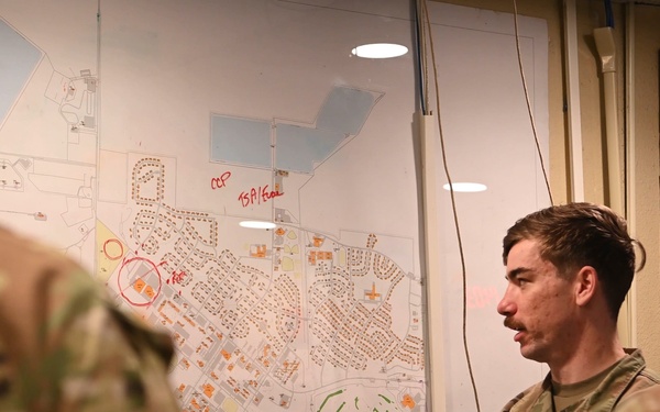 Defenders from the 5th Security Forces Squadron conduct joint training with the 816th Military Police Company