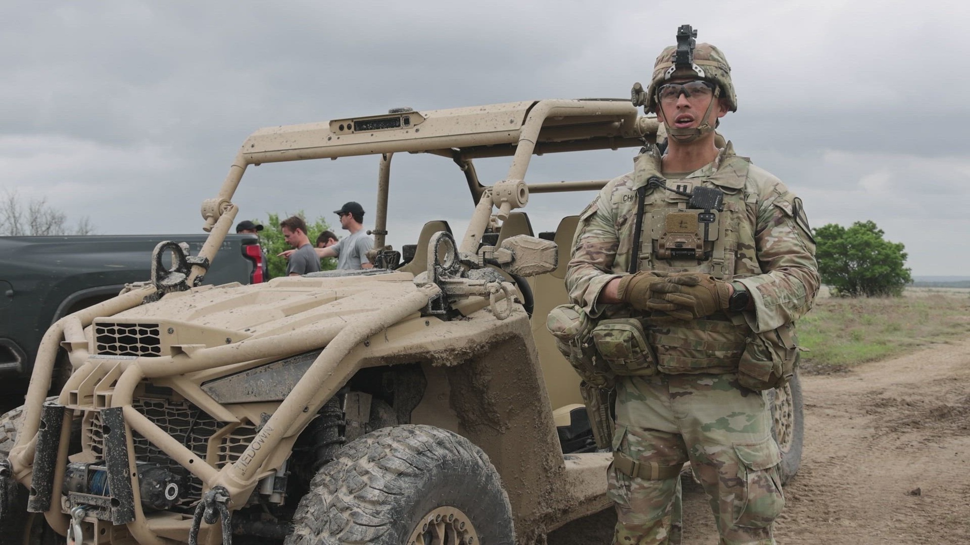 Cpt. Edgar Chong, commander of J-Forward Support Company, 2nd Battalion, 5th Cavalry Regiment, 1st Cavalry Division, and Pvt. 1st Class Jailen Lopez, a 92Y supply specialist assigned to 2nd Battalion, 5th cavalry Regiment, 1st Cavalry Division, describe the capabilities of an autonomous driving system embedded on a Polaris MRAZR Alpha lightweight tactical vehicle on Fort Hood, Texas, April 17, 2026. The system is developed within a machine-learning artificial intelligence developed by one of 1st Cavalry Division's industry partners to advance the U.S. Army's Transforming in Contact initiative, increasing the agility and survivability of maneuver formation Troopers in a tactical environment. (U.S. Army video by Staff Sgt. Zelika Stewart and Spc. Julian Winston)