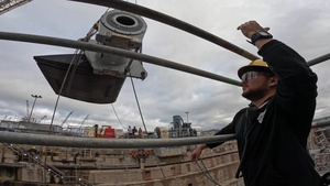 Shipyard Chronicles: Riggers Install a Port Retractable Bow Plane Into a Submarine