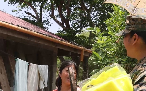 Balikatan 2026 B-Roll: US, Philippine service members pass out mosquito nets Santa Ana