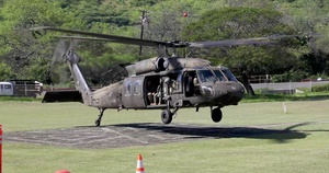 Emergency management leaders discuss Hawaii National Guard support and flight observations of flood impacted areas on Oahu