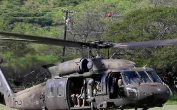 Emergency management leaders discuss Hawaii National Guard support and flight observations of flood impacted areas on Oahu