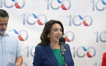 Ribbon cutting ceremony celebrating the first commercial flight from the United States to Venezuela in seven years