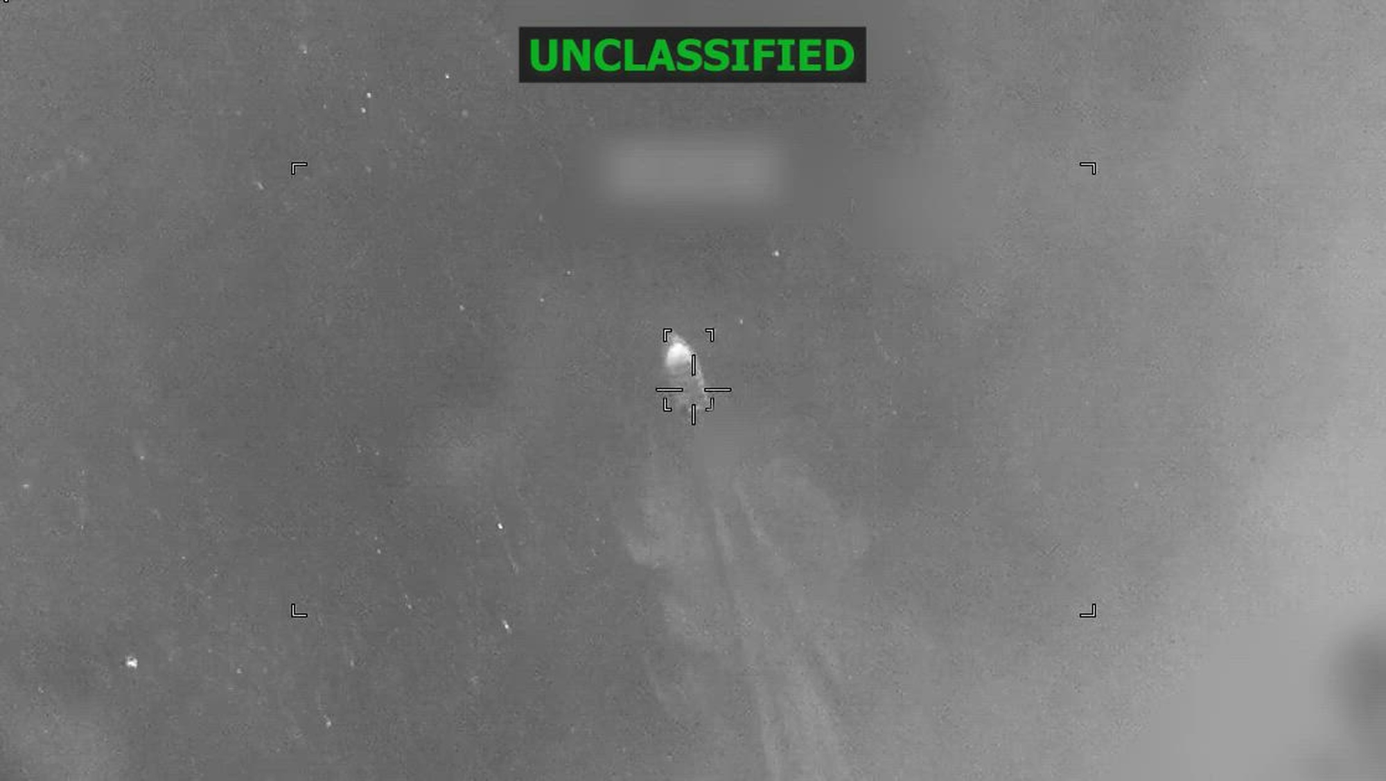 Black and white overhead footage of a boat.
