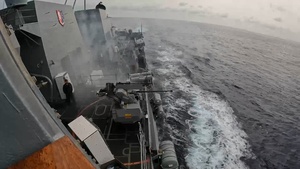 USS Mustin conducts a live-fire exercise with a Mk 38 Mod 4 machine gun
