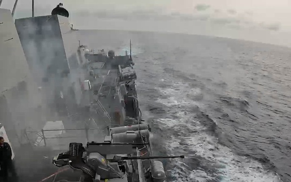 USS Mustin conducts a live-fire exercise with a Mk 38 Mod 4 machine gun
